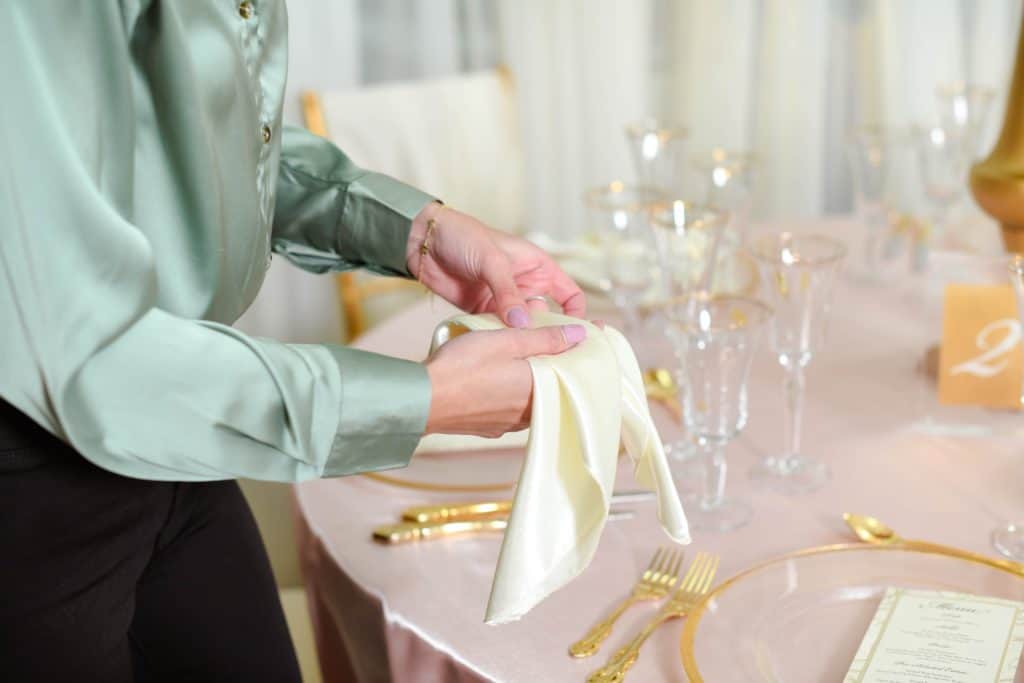 placing napkins on table
