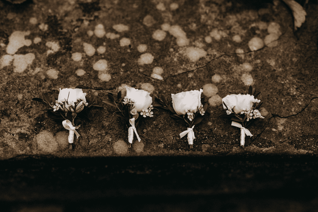 white corsages in a line