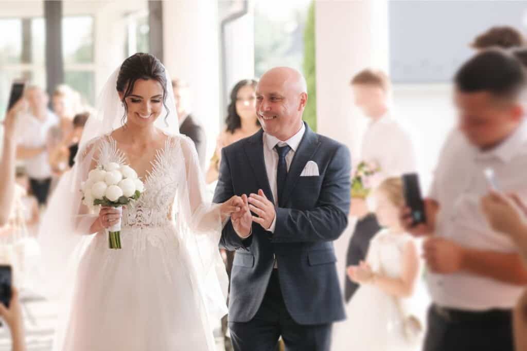 father walking bride down the aisle